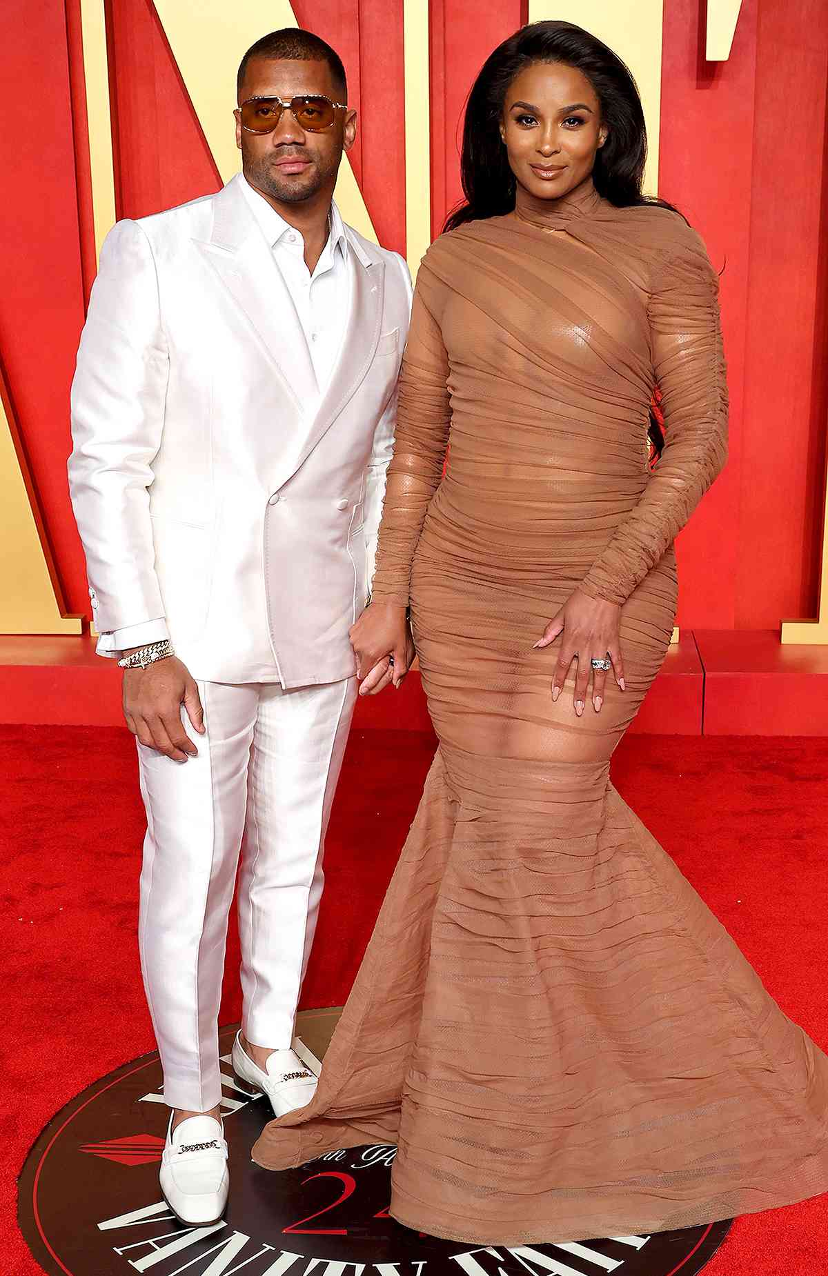 Russell Wilson and Ciara attend the 2024 Vanity Fair Oscar Party