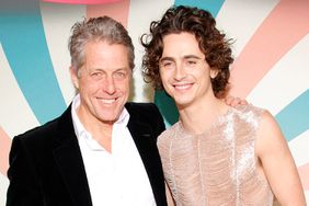 Hugh Grant and TimothÃ©e Chalamet attend the "Wonka" Premiere at Cinema UCG Normandie
