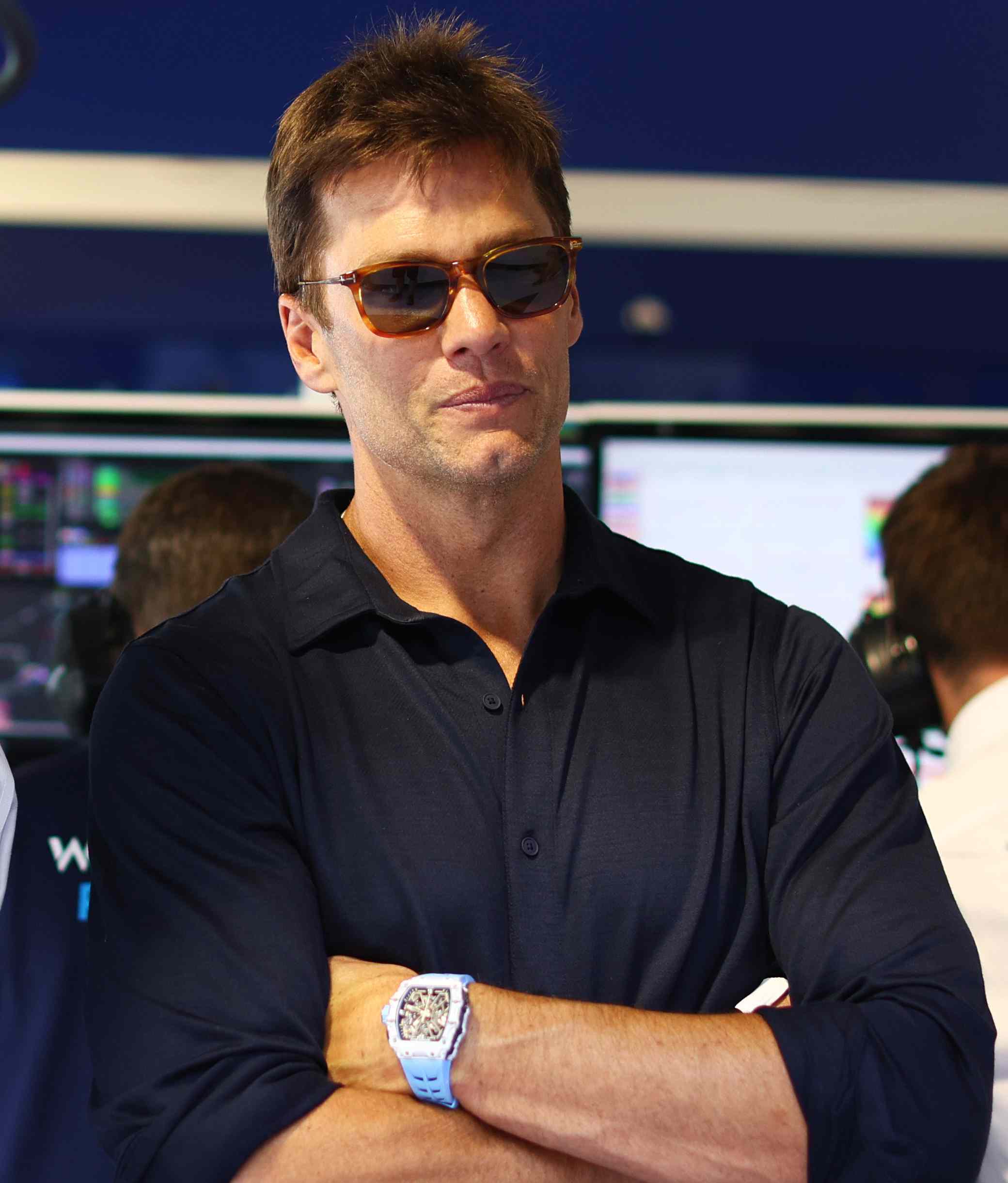 Tom Brady looks on in the Williams garage during practice ahead of the F1 Grand Prix of Miami