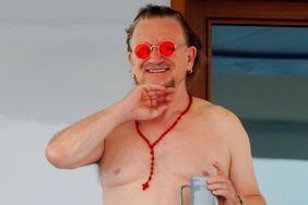 U2 Singer Bono pictured showing off his impressive physique while enjoying his coffee onboard his mega yacht in St Tropez.