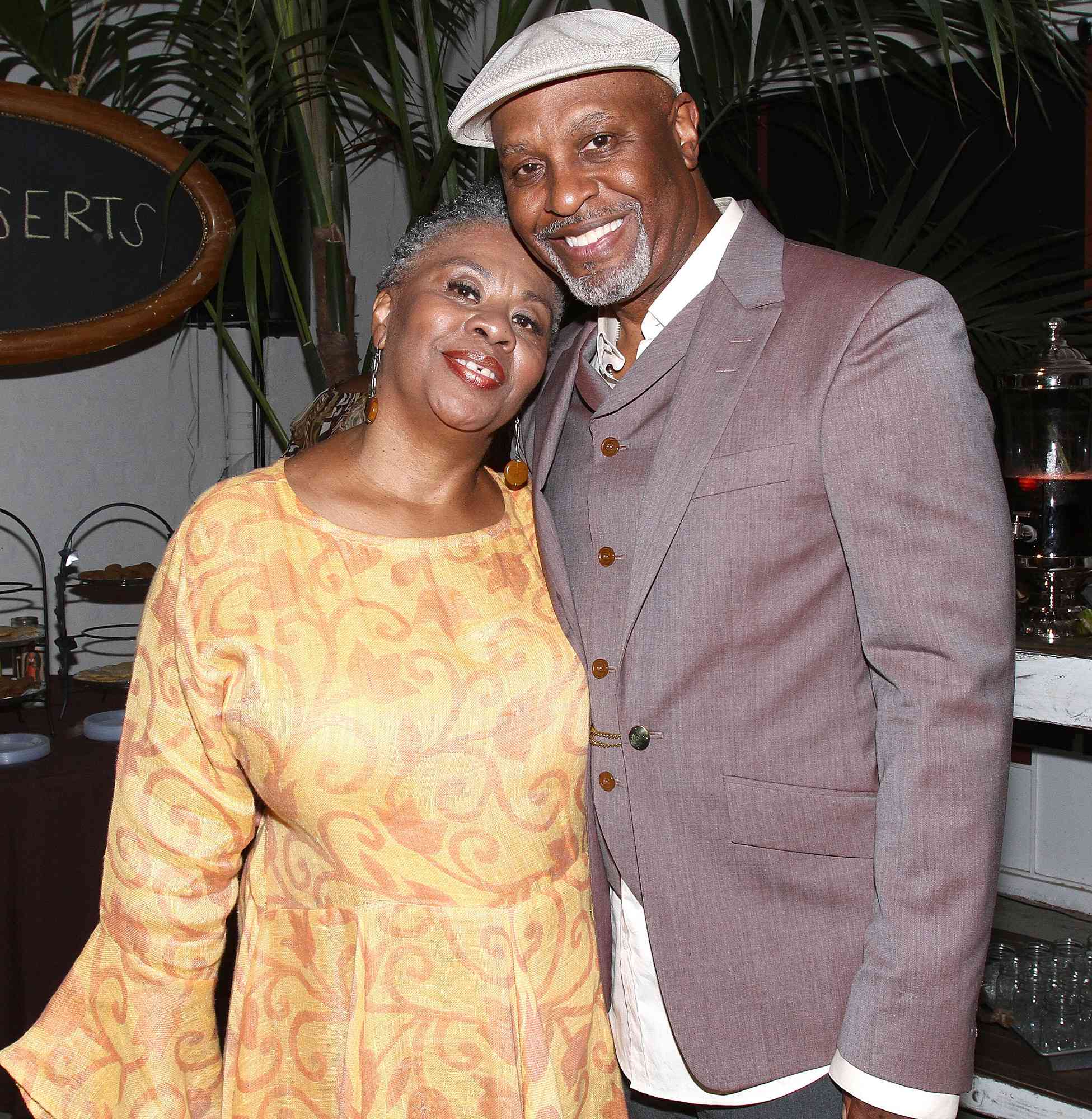 James Pickens Jr. (R) and wife Gina Taylor Pickens attend a Pre-Emmy Food Tasting Mixer hosted by "Grey's Anatomy" Star James Pickens Jr. and wife Gina with Kim Crooms on September 18, 2013 in Los Angeles, California.