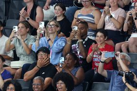  Family members of Simone Biles including her husband, Jonathan Owens (2nd-R) and mother Nellie Biles (R) look on during the Artistic Gymnastics Women's All-Around Final on day six