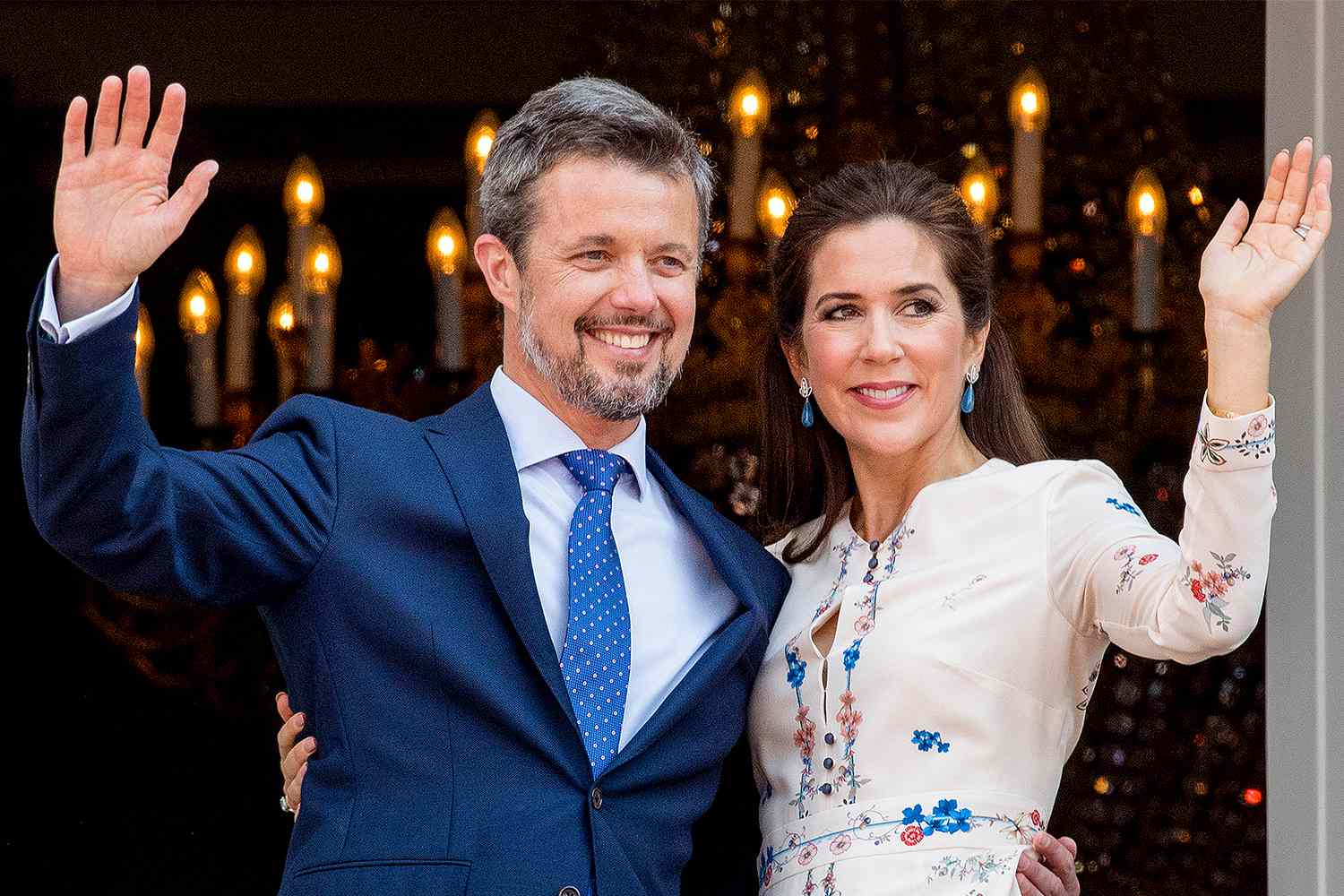 Crown Prince Frederik of Denmark and Crown Princess Mary of Denmark appear on the balcony as the Royal Life Guards carry out the changing of the guard on Amalienborg Palace square on the occasion of the 50th birthday of The Crown Prince Frederik of Denmark on May 26, 2018 in Copenhagen, Denmark.