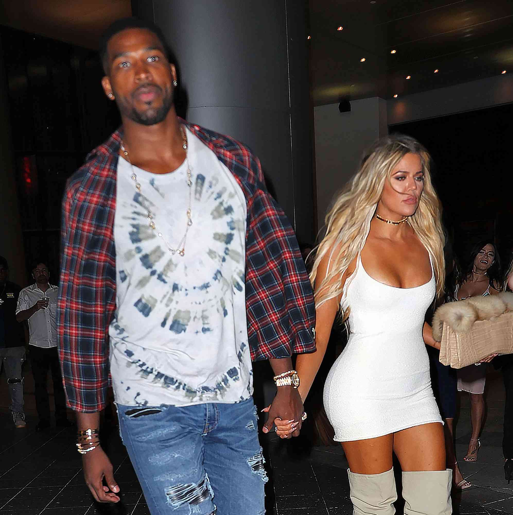 EXCLUSIVE: Khloe Kardashian and Tristan Thompson hold hands after dinner at Zuma in Miami