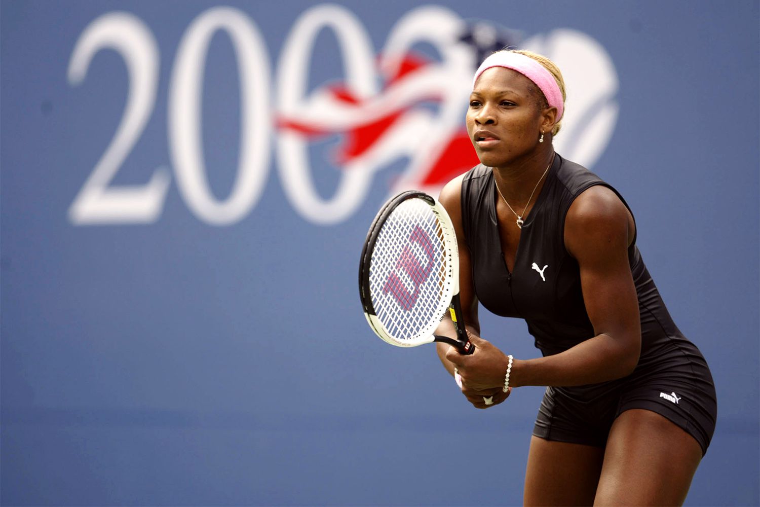 FLUSHING, NY - AUGUST 28: Serena Williams waits for a serve from Dinara Safina of Russia during the US Open on August 28, 2002 at the USTA National Tennis Center in Flushing Meadows Corona Park in Flushing, New York. (Photo by Gary M. Prior/Getty Images)