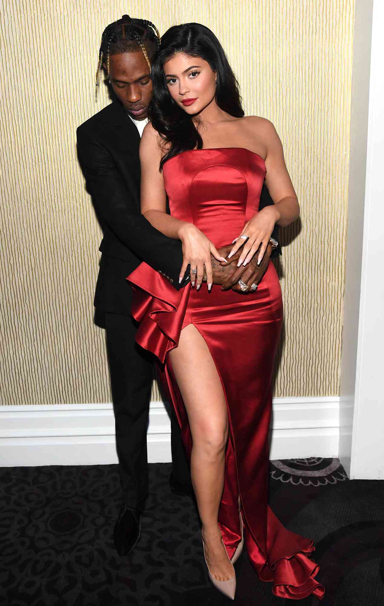 Travis Scott (L) and Kylie Jenner pose during the Pre-GRAMMY Gala and GRAMMY Salute to Industry Icons Honoring Clarence Avant at The Beverly Hilton Hotel on February 9, 2019 in Beverly Hills, California