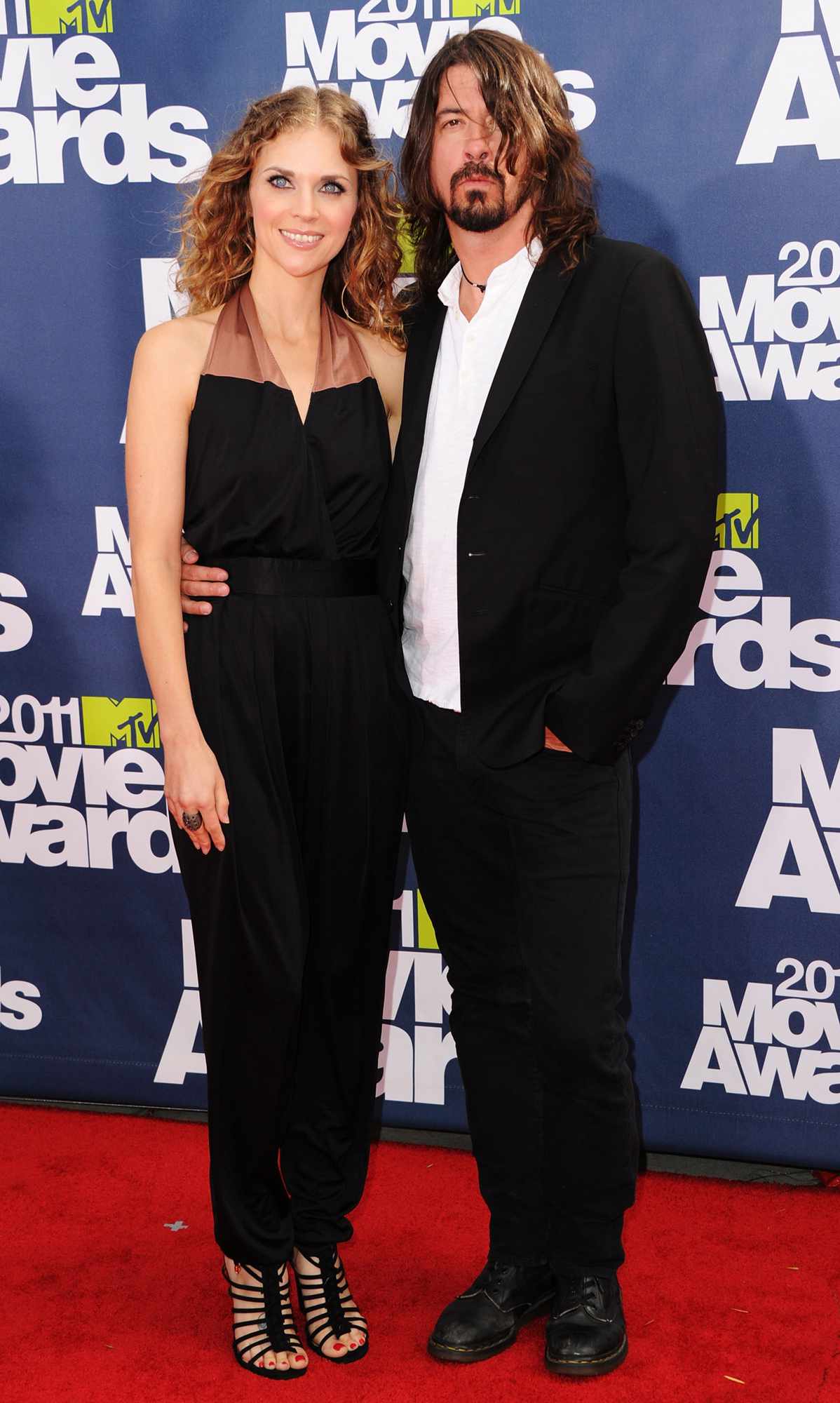 Jordyn Blum Grohl and musician Dave Grohl of the Foo Fighters arrive at the 2011 MTV Movie Awards at Universal Studios' Gibson Amphitheatre on June 5, 2011 in Universal City, California