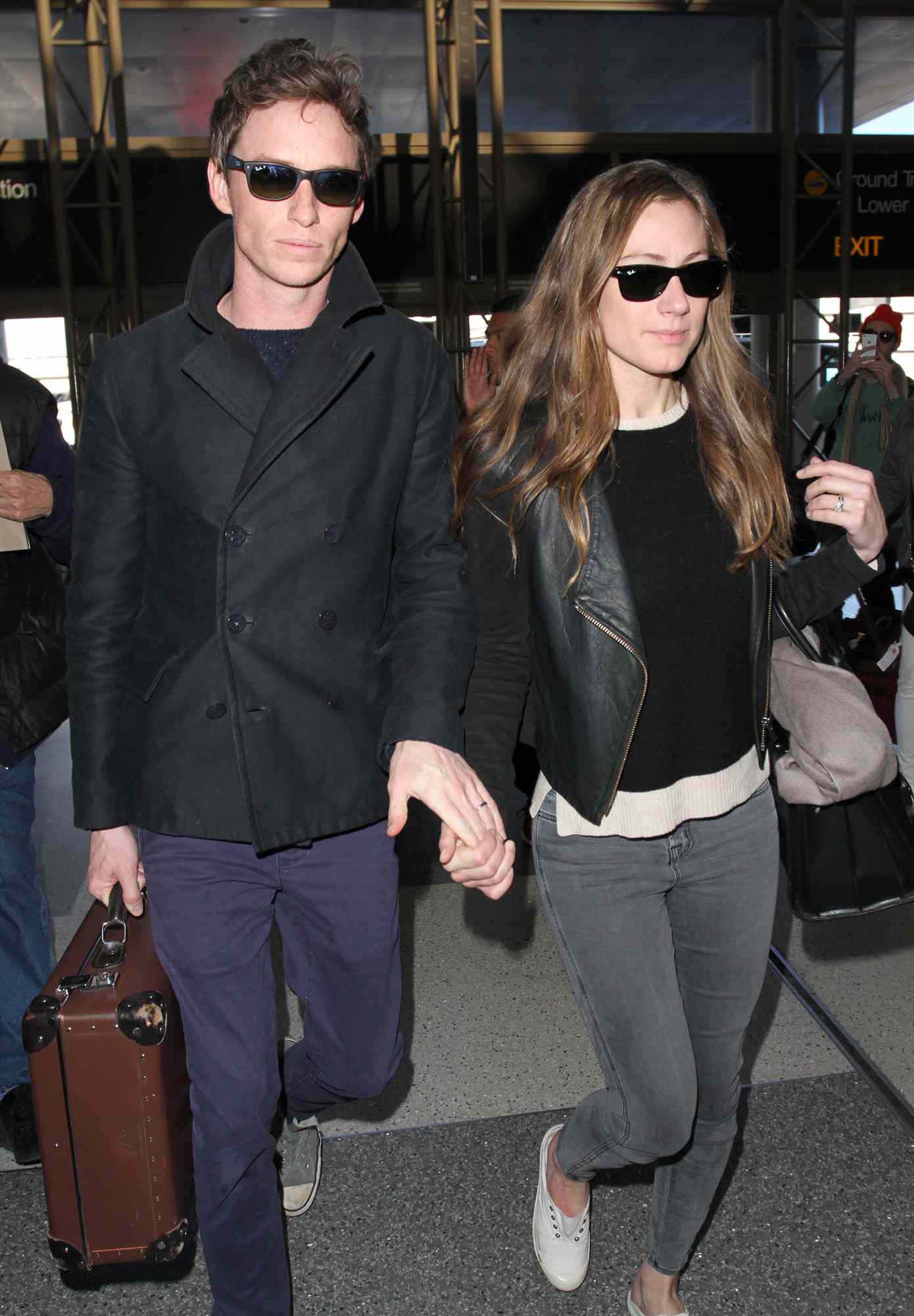 Eddie Redmayne and Hannah Bagshawe seen at LAX on February 23, 2015 in Los Angeles, California