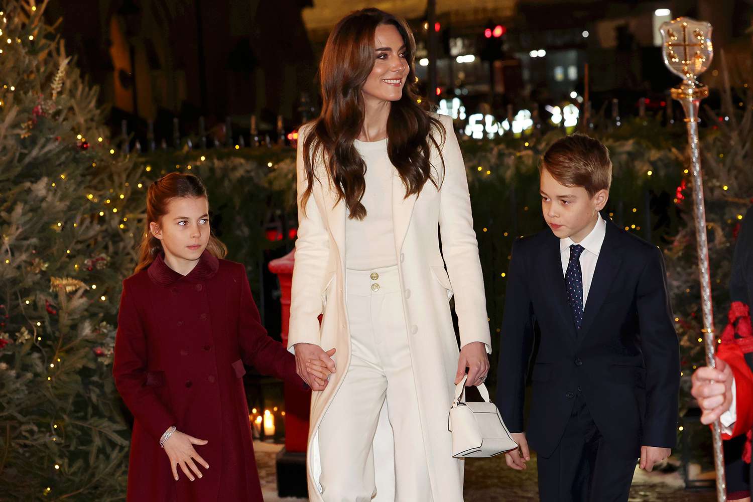 Princess Charlotte of Wales, Catherine, Princess of Wales and Prince George of Wales attend The "Together At Christmas" Carol Service at Westminster Abbey on December 08, 2023 in London, England. Spearheaded by The Princess of Wales, and supported by The Royal Foundation, the service is a moment to bring people together at Christmas time and recognise those who have gone above and beyond to help others throughout the year.