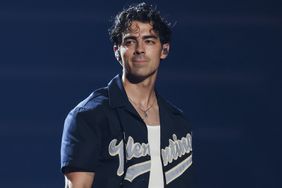 Joe Jonas performs onstage during Jonas Brothers Ã¢ÂÂFive Albums, One NightÃ¢ÂÂ Tour 