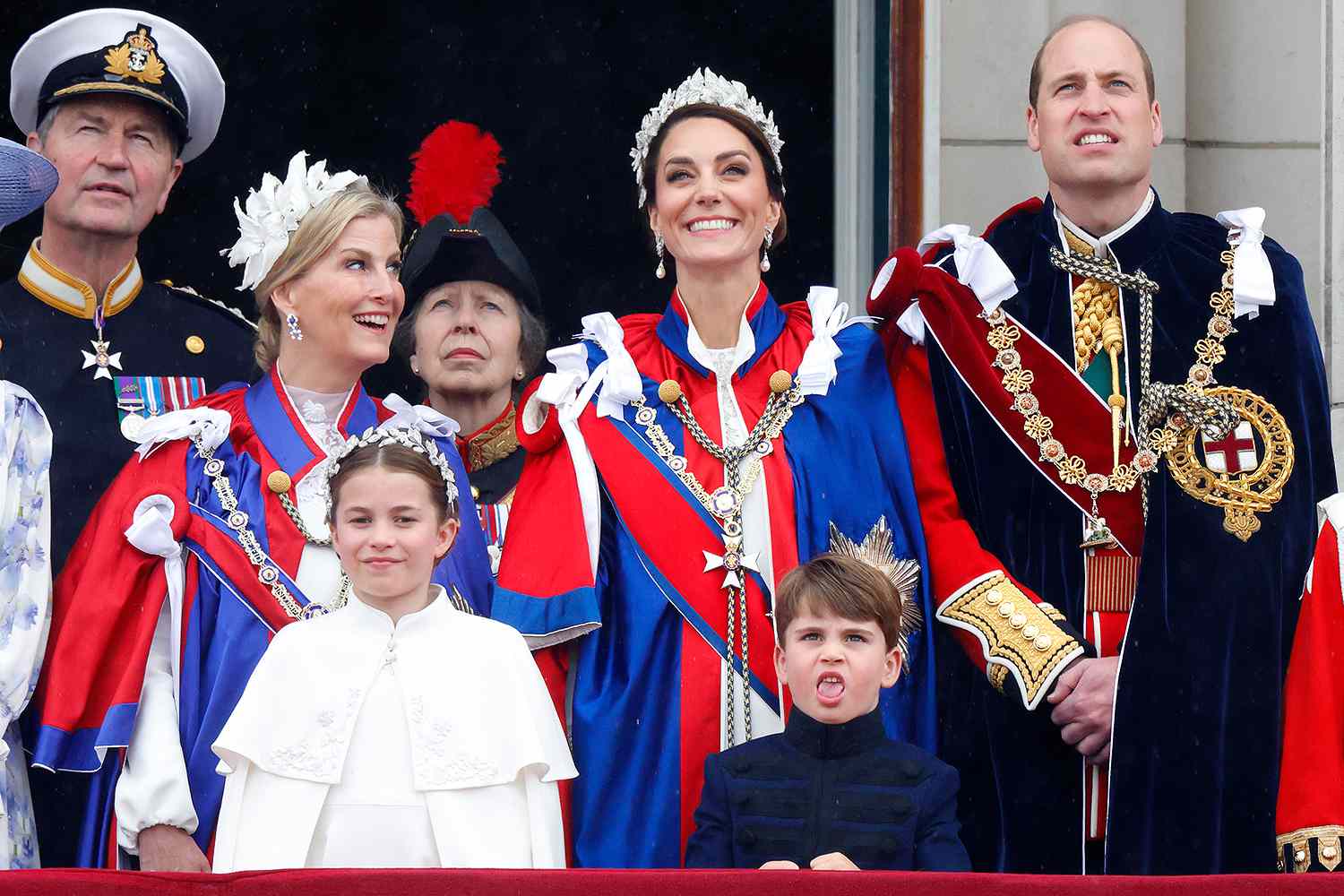 Vice Admiral Sir Timothy Laurence, Sophie, Duchess of Edinburgh (wearing the Mantle of the Royal Victorian Order), Princess Charlotte of Wales, Princess Anne, Princess Royal, Catherine, Princess of Wales (wearing the Mantle of the Royal Victorian Order), Prince Louis of Wales and Prince William, Prince of Wales (wearing the Mantle of the Order of the Garter) watch an RAF flypast from the balcony of Buckingham Palace following the Coronation of King Charles III & Queen Camilla at Westminster Abbey on May 6, 2023 in London, England. The Coronation of Charles III and his wife, Camilla, as King and Queen of the United Kingdom of Great Britain and Northern Ireland, and the other Commonwealth realms takes place at Westminster Abbey today. Charles acceded to the throne on 8 September 2022, upon the death of his mother, Elizabeth II.