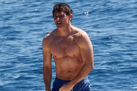 James Marsden seen at the hotel Eden Roc Cap d'Antibes during the 76th Cannes Film festival 2023 enjoying a swim with a friend and looking hunky in blue swimming trunks