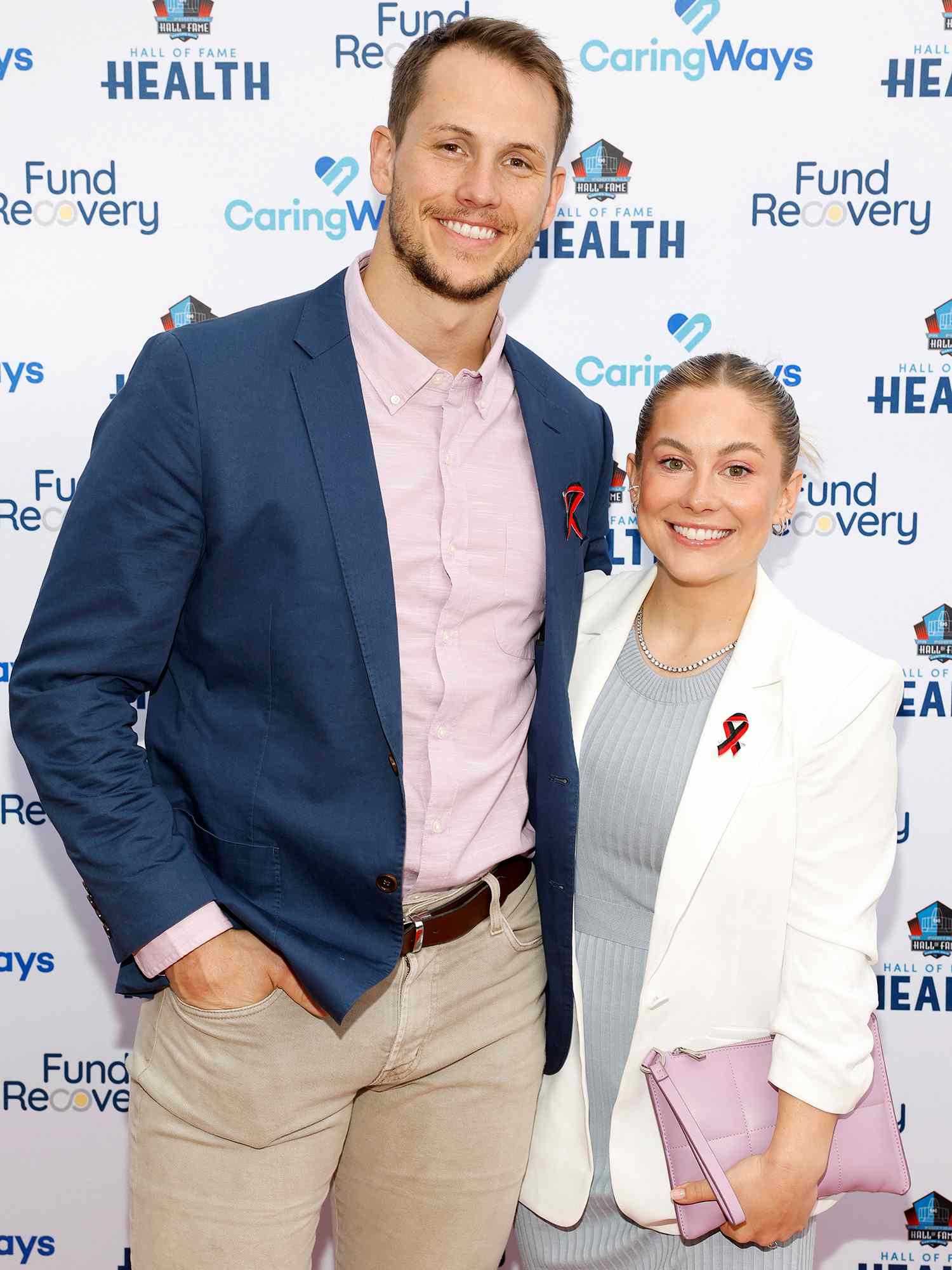 Andrew East and Shawn Johnson East, wearing The Covenant School ribbon, attend the Pro Football Hall Of Fame's Family Recovery Fund charity concert and dinner