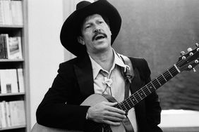  Crime writer Kinky Friedman, guitar and vocals, performs at H.W. Smith bookstore on June 20th 1993 in Amsterdam, the Netherlands.