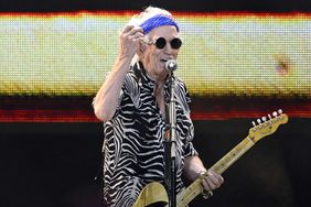 British musician Keith Richards performs on stage during a concert of British rock band The Rolling Stones in the Ernst-Happel Stadium in Vienna on July 15, 2022.