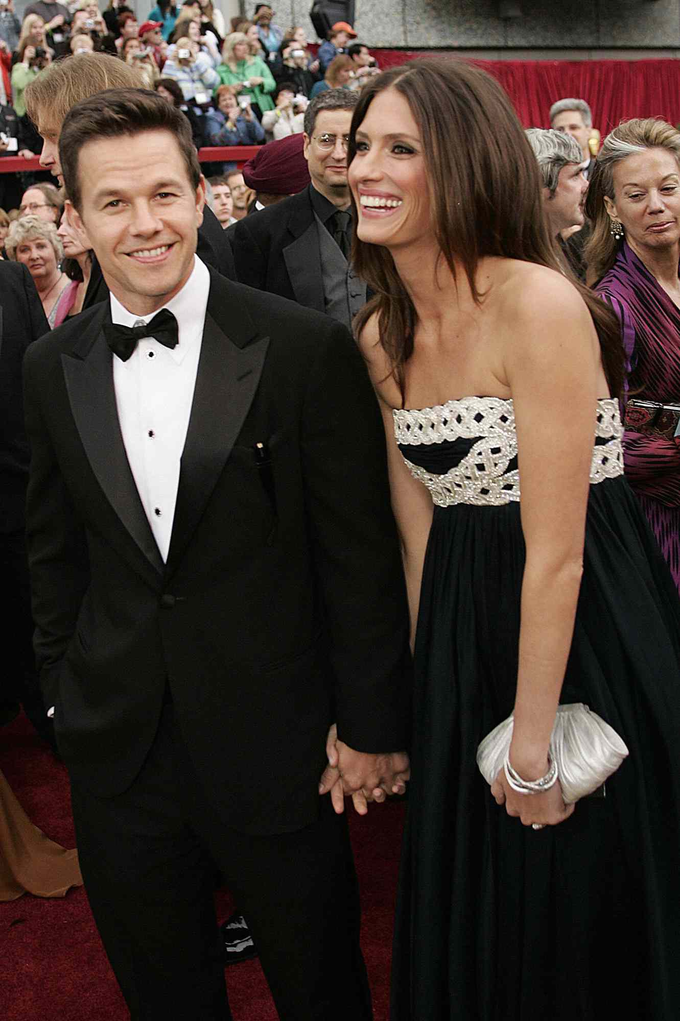 Mark Wahlberg, nominee for Best Supporting Actor for his work in "The Departed," and model Rhea Durham arrive at the 79th Academy Awards in Hollywood, California