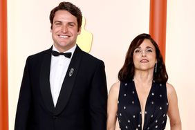 Henry Hall and Julia Louis-Dreyfus attend the 95th Annual Academy Awards on March 12, 2023 in Hollywood, California.