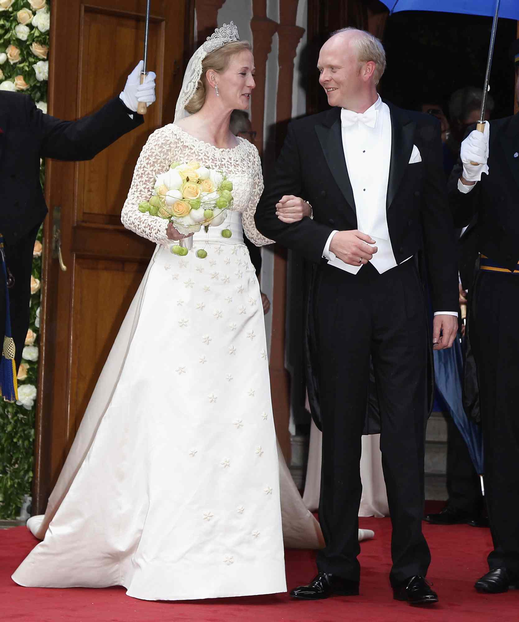 Princess Nathalie zu Sayn-Wittgenstein-Berleburg and Alexander Johannsmann leave after getting married the evangelic Stadtkirche on June 18, 2011 in Bad Berleburg, Germany