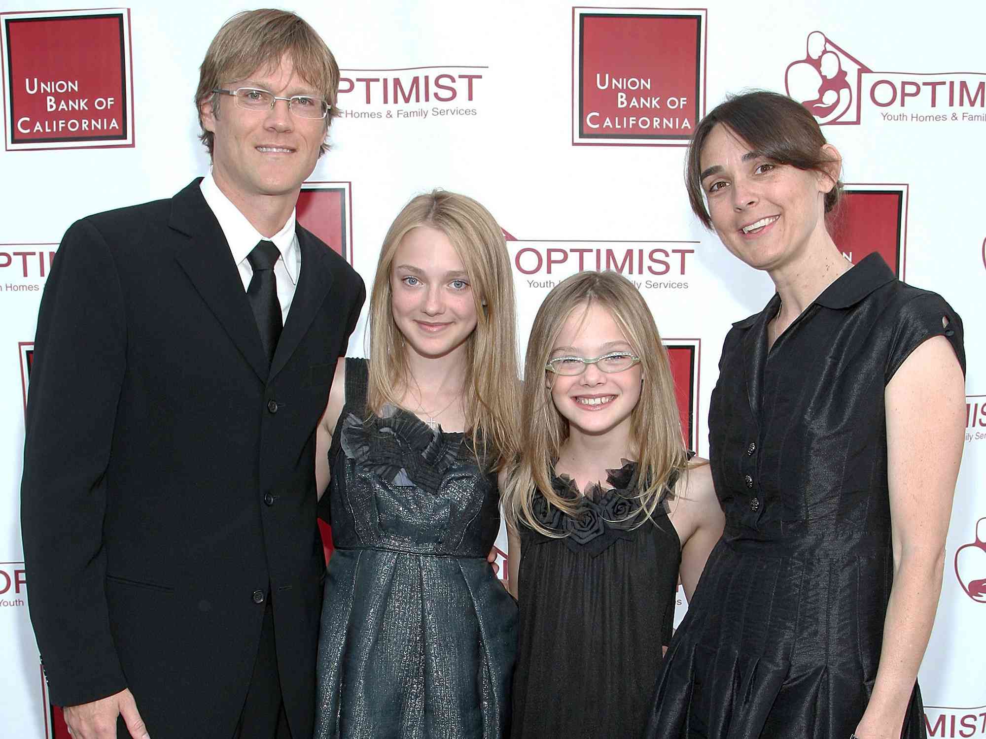 Steve Fanning, Dakota Fanning, Elle Fanning and Hannah Joy Fanning at The Optimist Youth Homes & Family Services' 2008 Mentor Awards Dinner and Fashion Show on Octorber 22, 2008 in Universal City, California. 