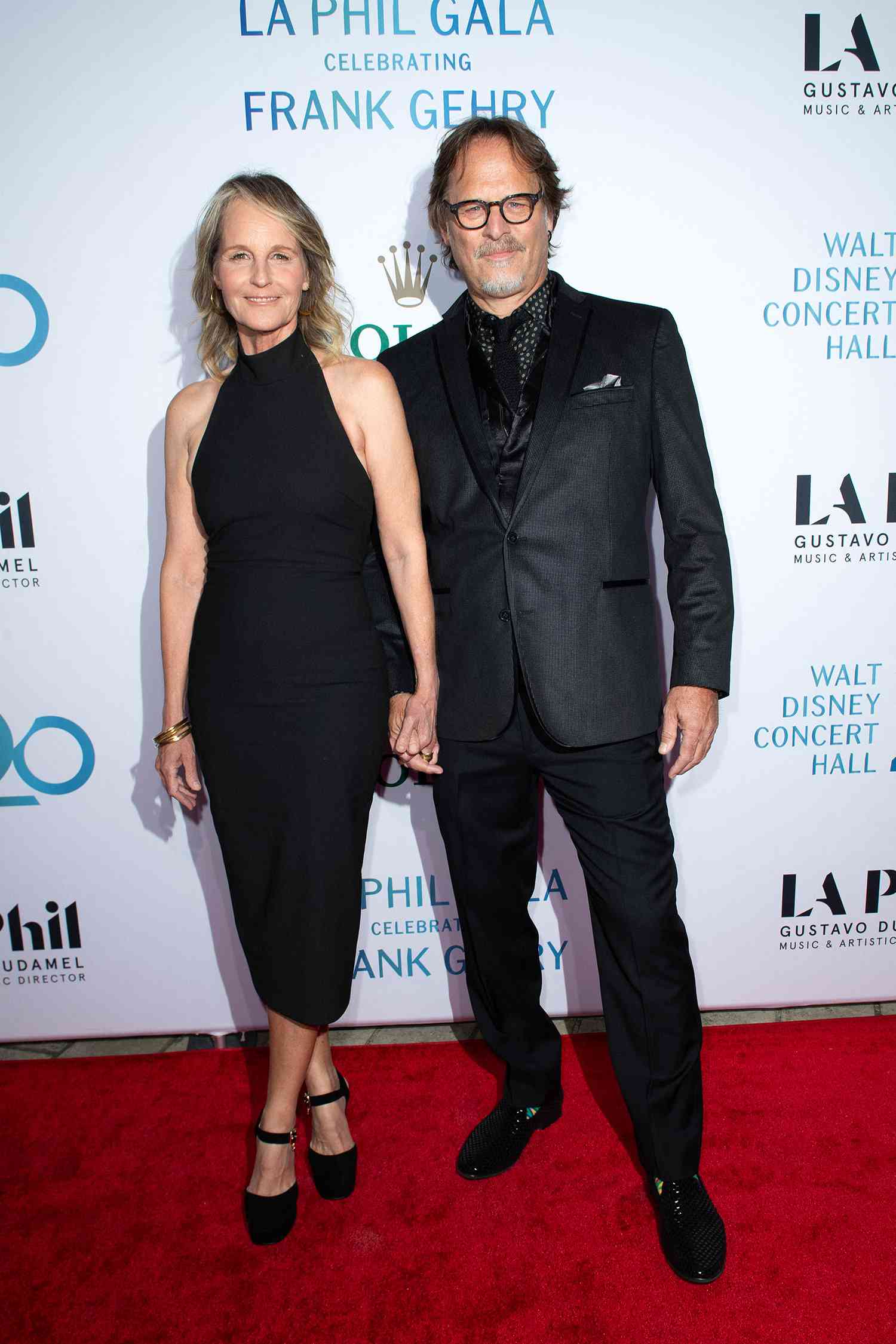 US actress Helen Hunt (L) and US actor Jeffrey Nordling arrive for the Los Angeles Philharmonic Gala Celebrating Frank Gehry, at the Walt Disney Concert Hall in Los Angeles, California, on October 5, 2023