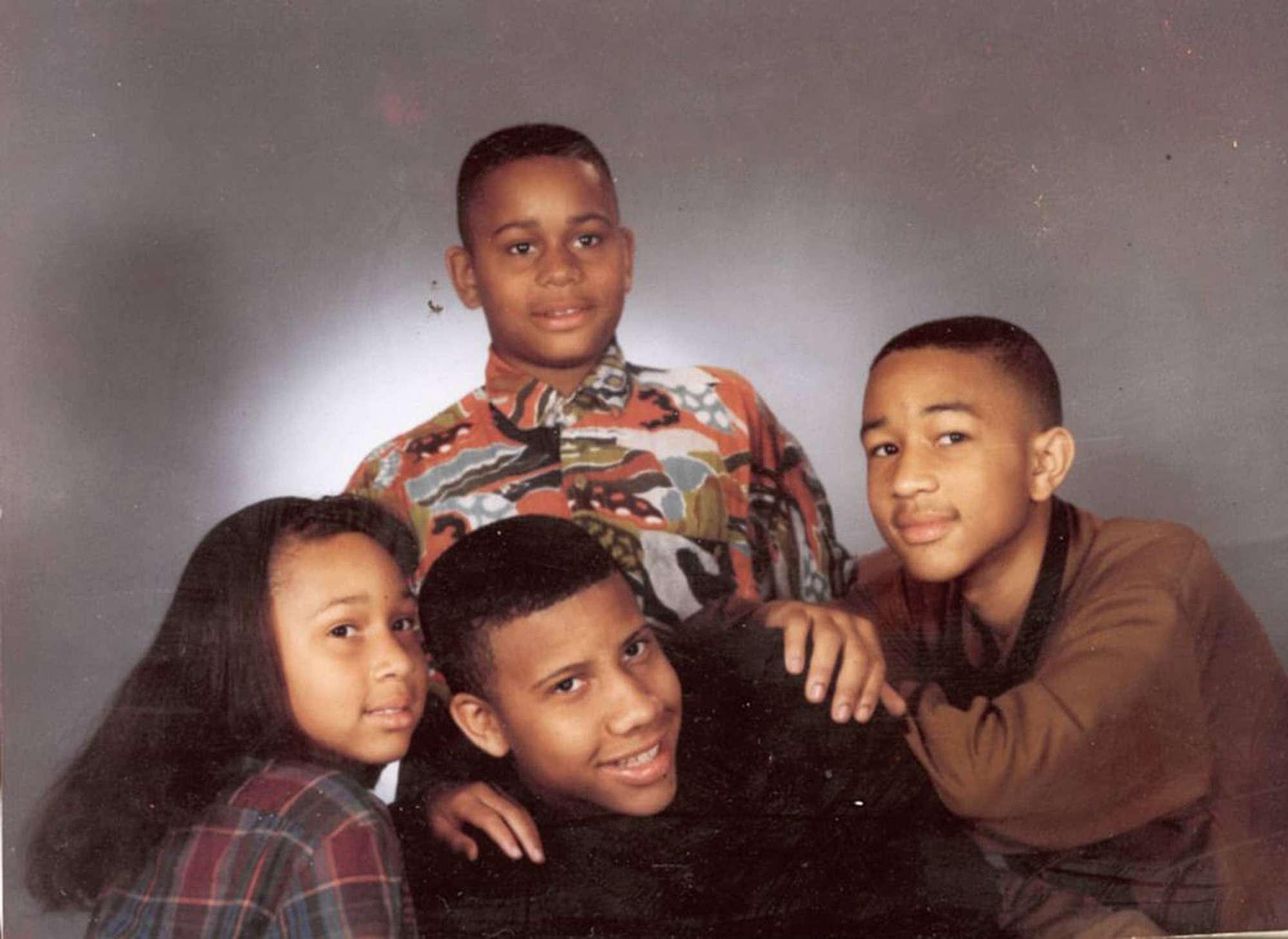 John Legend with his siblings, Ronald, Vaughn, and Missy