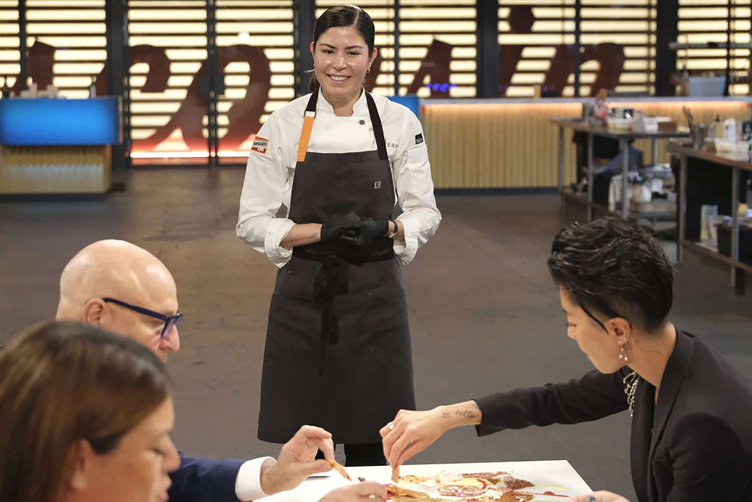 TOP CHEF -- "Lay It All on the Table" Episode 2111 -- Pictured: (l-r) Gail Simmons, Tom Colicchio, Laura Ozyilmaz, Kristen Kish -- 