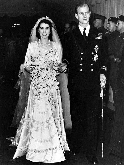 Queen Elizabeth II, as Princess Elizabeth, and her husband the Duke of Edinburgh, styled Prince Philip in 1957, on their wedding day. She became queen on her father King George VI's death in 1952.