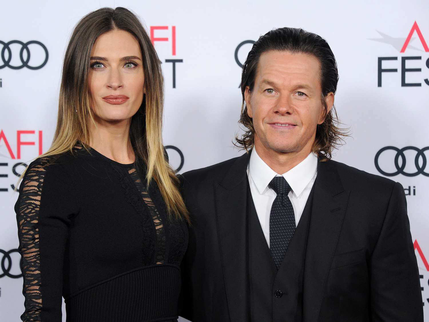 Mark Wahlberg and model Rhea Durham arrive at the AFI FEST 2016 Presented By Audi - Closing Night Gala - Screening Of Lionsgate's "Patriots Day" at TCL Chinese Theatre on November 17, 2016 in Hollywood, California