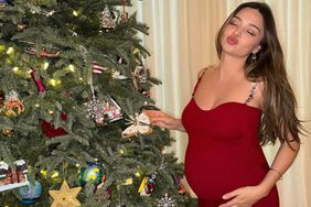  Miranda Kerr Shows Off Her Baby Bump in Festive Red Dress: âTis the Seasonâ