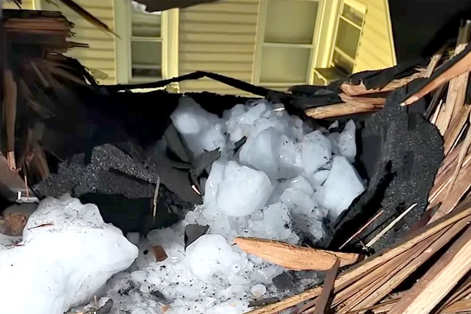 Large chunk of ice crashes through family's roof in Paterson nj.