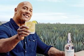 Dwayne Johnson with a bottle of Teremana