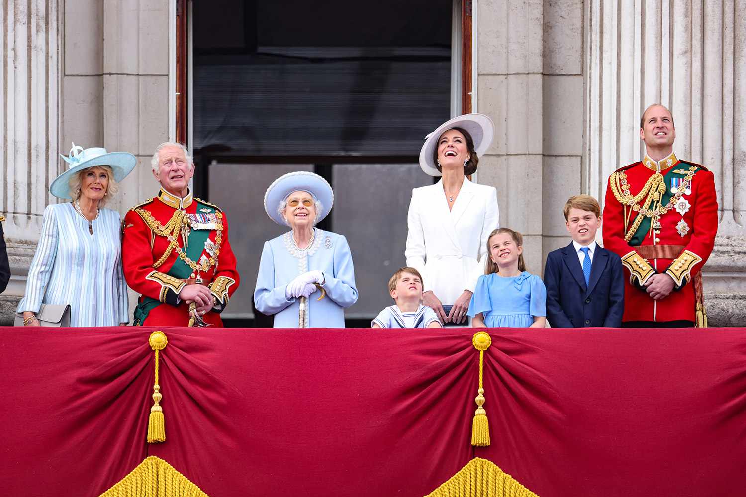 Camilla, Duchess of Cornwall, Prince Charles, Prince of Wales, Queen Elizabeth II, Prince Louis of Cambridge, Catherine, Duchess of Cambridge, Princess Charlotte of Cambridge, Prince George of Cambridge and Prince William, Duke of Cambridge watch the RAF flypast on the balcony of Buckingham Palace during the Trooping the Colour parade on June 02, 2022