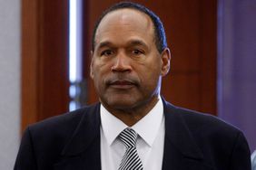 O.J. Simpson stands in court during his trial at the Clark County Regional Justice Center September 17, 2008 in Las Vegas, Nevada. Simpson is charged with a total of twelve counts including kidnapping, armed robbery and assault with a deadly weapon stemming from an alleged incident involving the theft of sports memorabilia. 