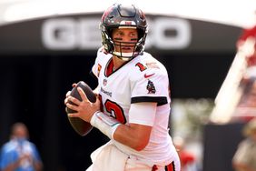 Tom Brady #12 of the Tampa Bay Buccaneers looks to pass during the third quarter against the Miami Dolphins at Raymond James Stadium on October 10, 2021 in Tampa, Florida.