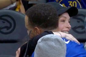 Lindsay Lohan Greets Steph Curry with a Hug as They Chat Before Golden State Warriors Game