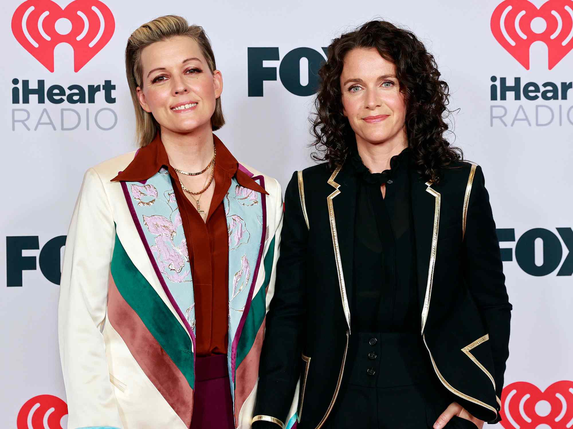 Brandi Carlile and Catherine Shepherd attends the 2021 iHeartRadio Music Awards at The Dolby Theatre in Los Angeles, California, which was broadcast live on FOX on May 27, 2021