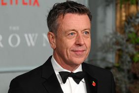 British screenwriter Peter Morgan poses on the red carpet upon arrival to attend the World Premiere of "The Crown (Season 5)" in London on November 8, 2022.