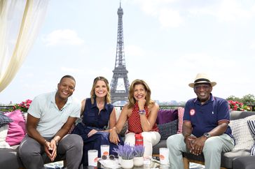 Craig Melvin, Savannah Guthrie, Hoda Kotb and Al Roker pose on the Today Show Set