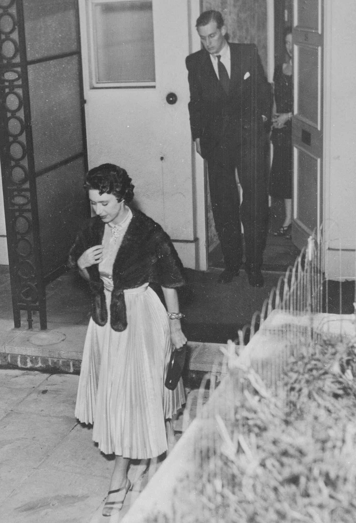 Princess Margaret leaves the London home of a friend after her second date in 12 hours with Group Captain Peter Townsend