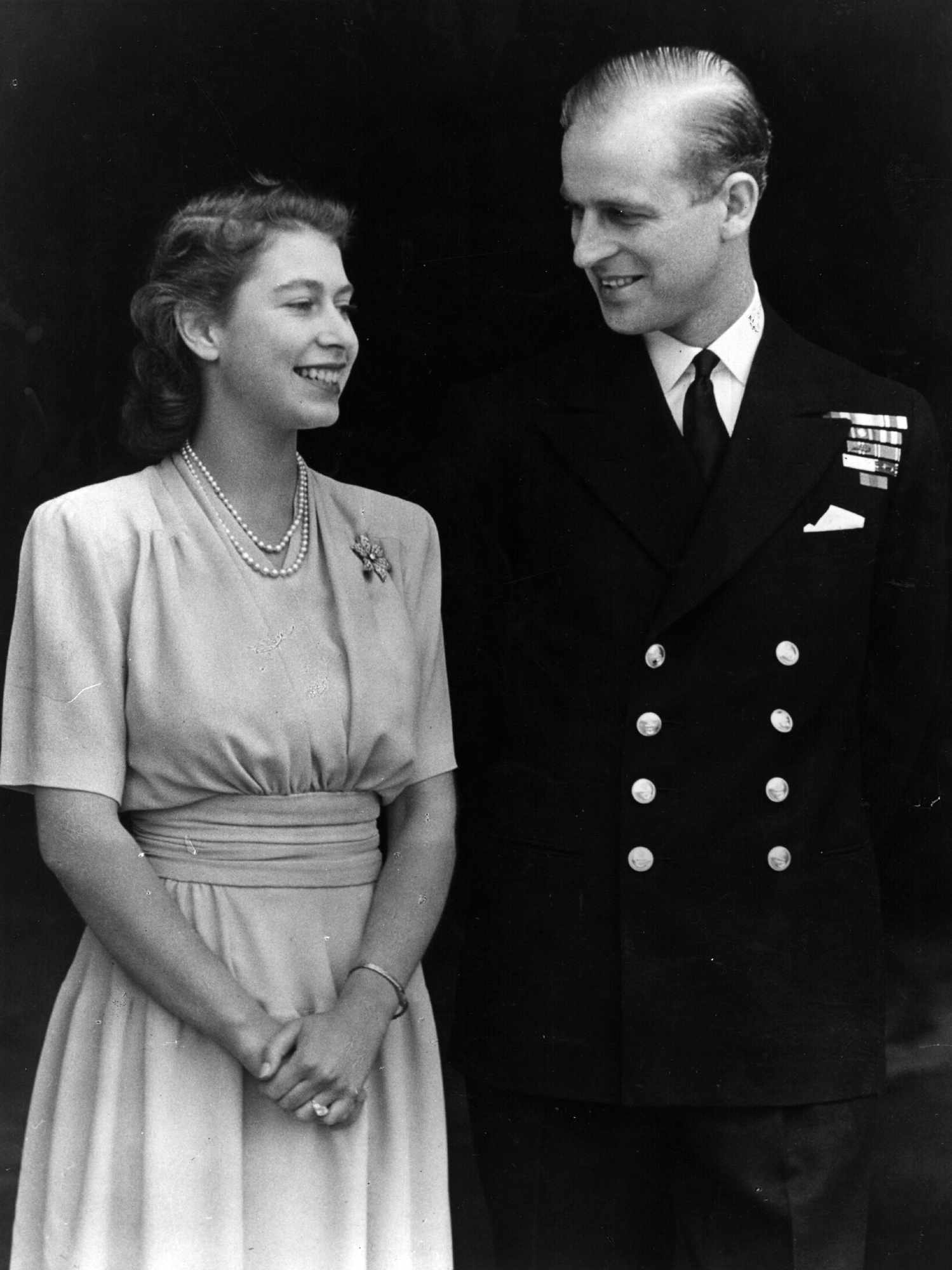 Princess Elizabeth and Philip Mountbatten, Duke of Edinburgh, on the occasion of their engagement at Buckingham Palace in London, July 1947