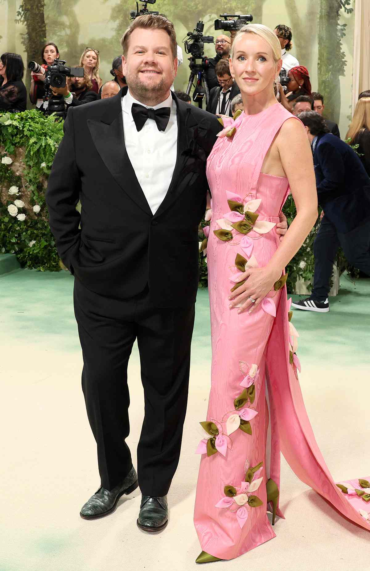 James Corden and Julia Carey attend The 2024 Met Gala Celebrating "Sleeping Beauties: Reawakening Fashion" at The Metropolitan Museum of Art on May 06, 2024 