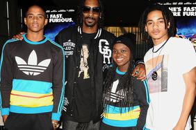 Snoop Dogg aka Snoop Lion and children Cordell Broadus, Cori Broadus and Corde Broadus at ArcLight Hollywood on July 16, 2013 