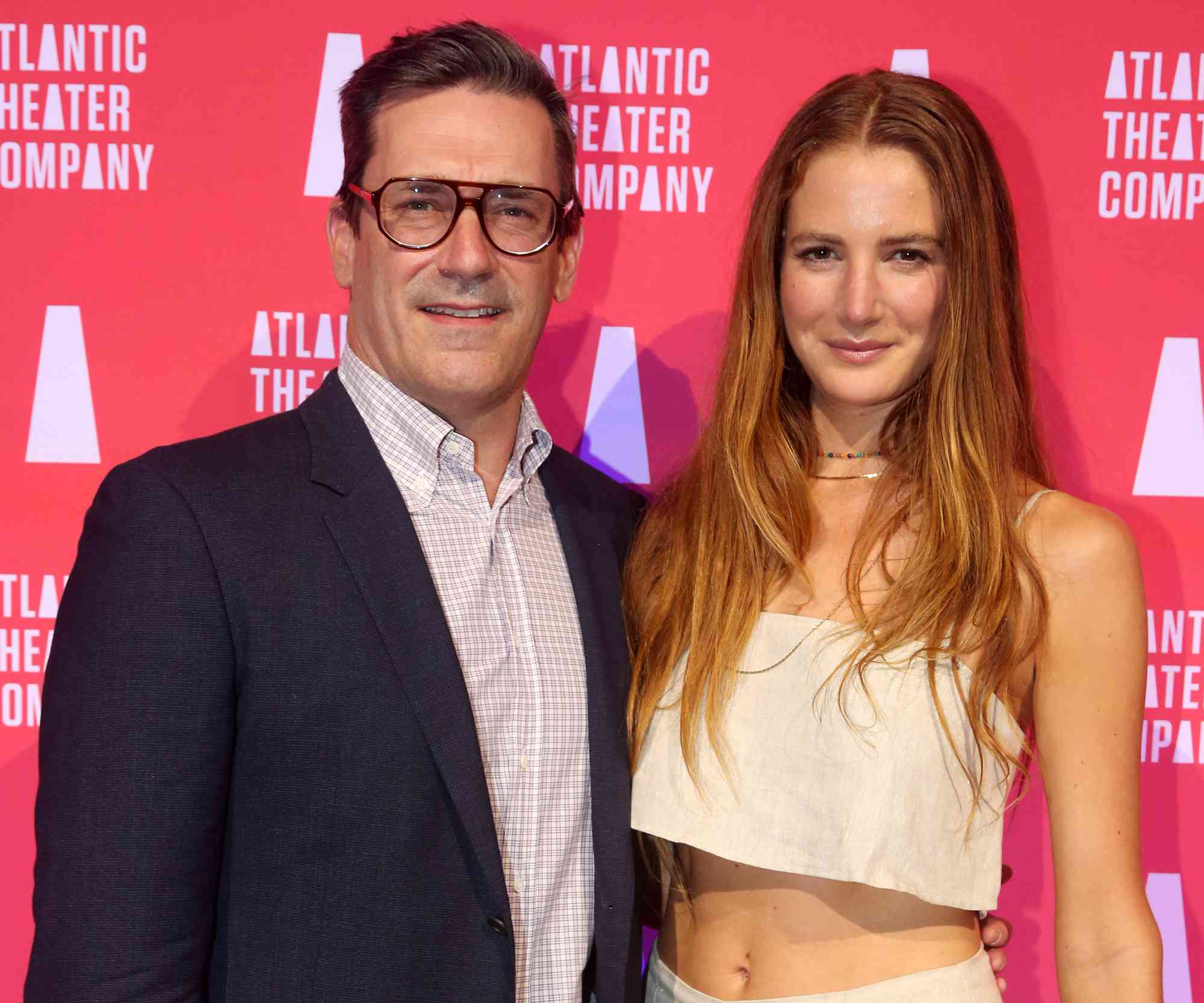 Jon Hamm and girlfriend Anna Osceola pose at the opening night of the new Sarah Silverman Musical "Bedwetter" at The Atlantic Theater Company Theater on May 23, 2022 in New York City