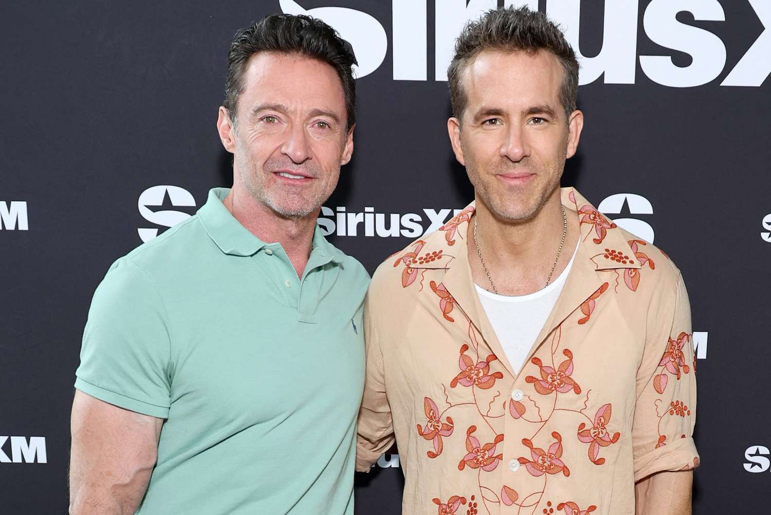 Hugh Jackman and Ryan Reynolds attend SiriusXM's Town Hall With Deadpool & Wolverine Cast and Director on July 19, 2024 in New York City. 