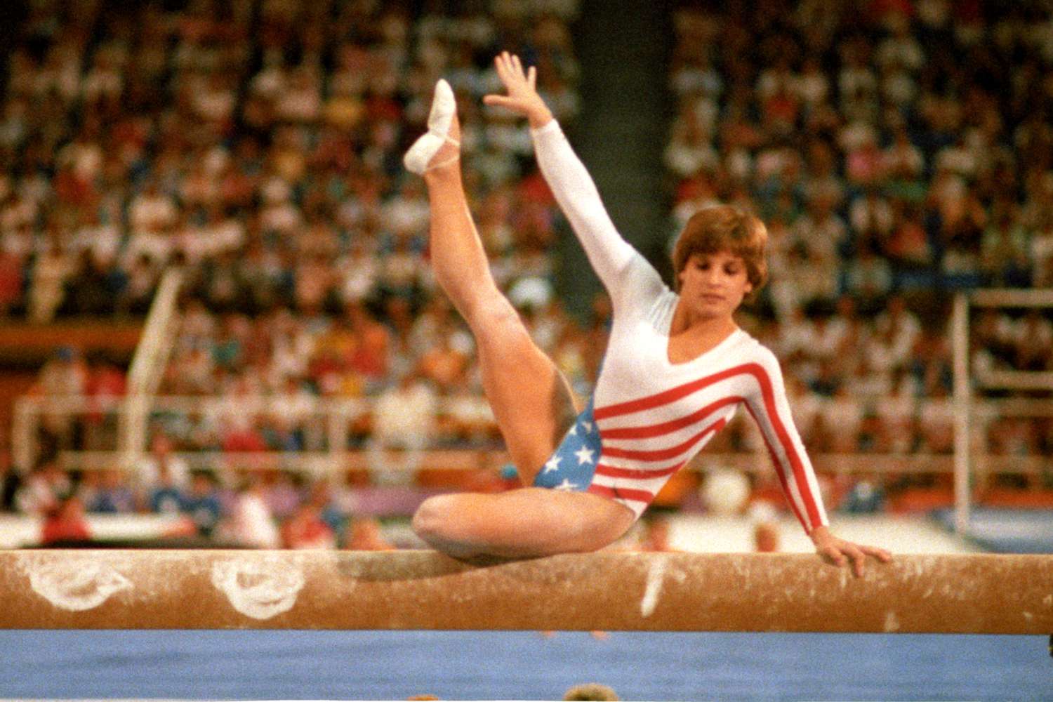 1984 Summer Olympics: USA Mary Lou Retton in action on balance beam during Women's All-Around Team competition at Pauley Pavilion