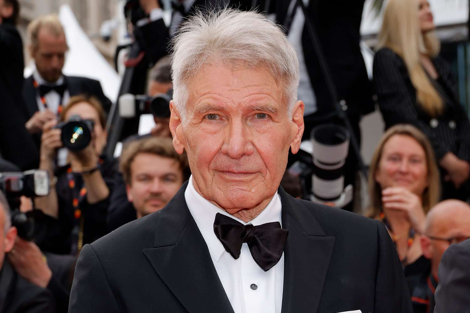 Harrison Ford attends the "Indiana Jones And The Dial Of Destiny" red carpet during the 76th annual Cannes film festival at Palais des Festivals on May 18, 2023