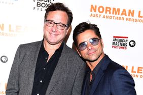 Actors Bob Saget and John Stamos attend the Los Angeles Premiere of NORMAN LEAR: JUST ANOTHER VERSION OF YOU on July 14, 2016 in Los Angeles, California.