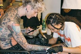 Machine Gun Kelly's Daughter Kicks Off Summer by Tattooing Dad During Travels to France's Hellfest https://www.instagram.com/p/CtuGhGjNayB