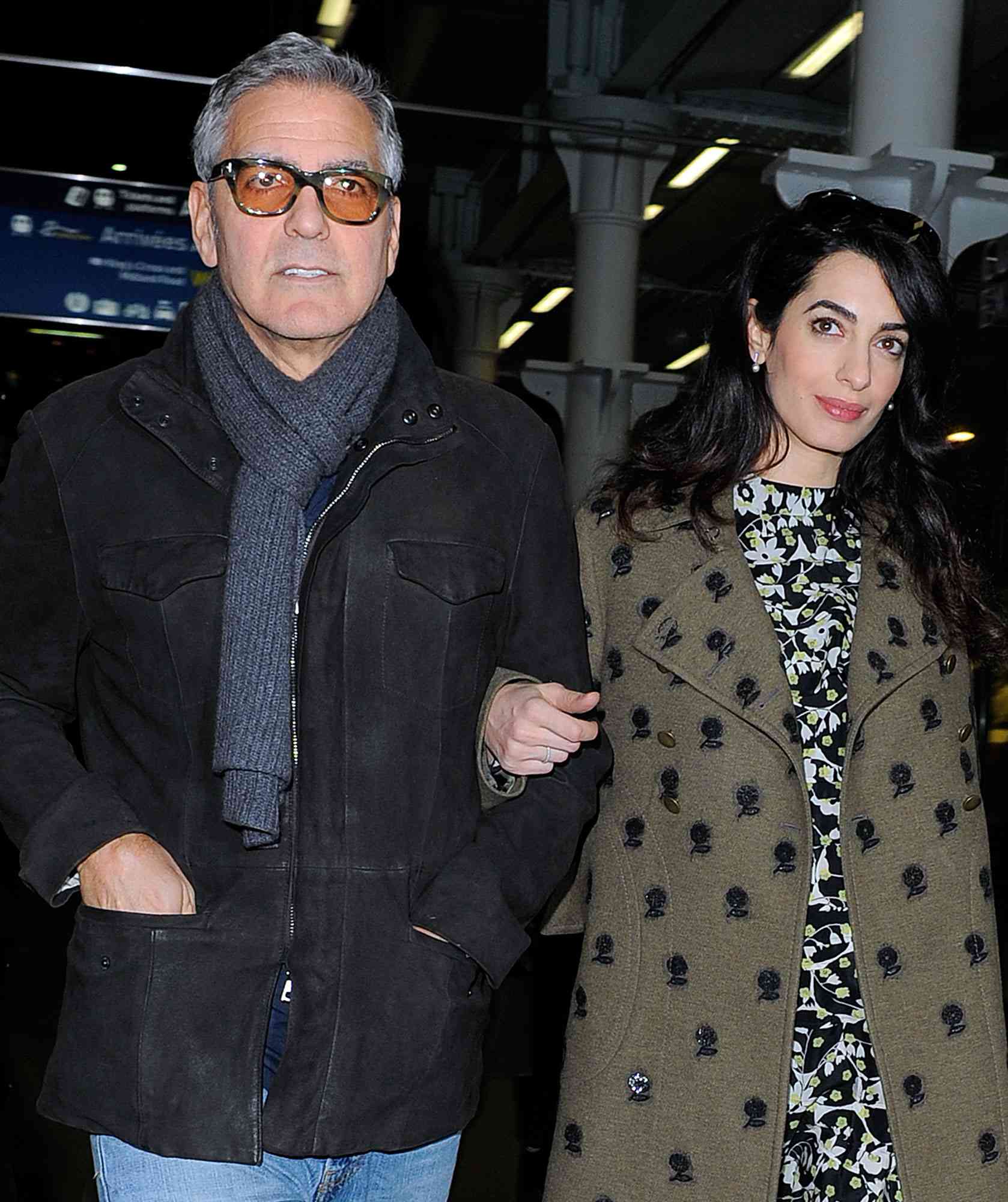 George Clooney and his pregnant wife Amal Clooney arriving at the Eurostar.