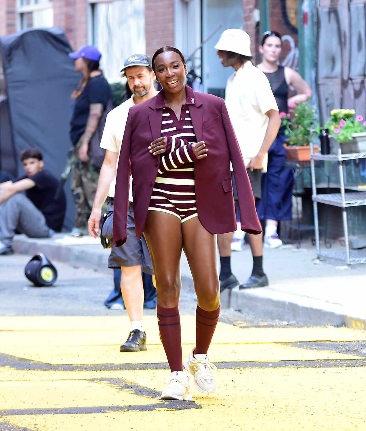 enus Williams is spotted during a photoshoot for Lacoste in New York City. The American professional tennis player modeled several different outfits on the tennis courts before taking the shoot to the streets. 
